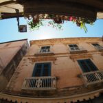 low angle photography of brown building during daytime